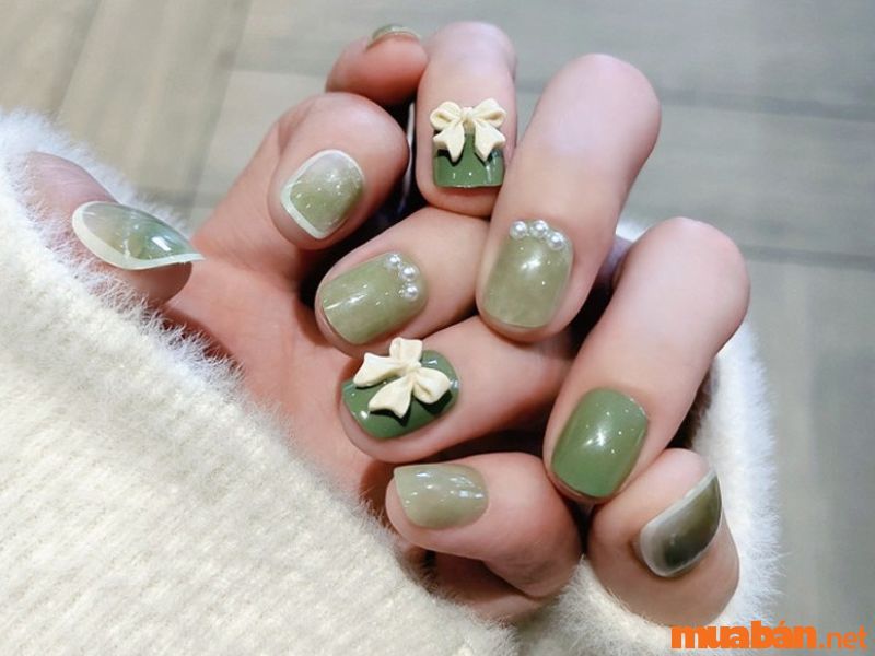 Mẫu nail xanh ngọc gắn nơ