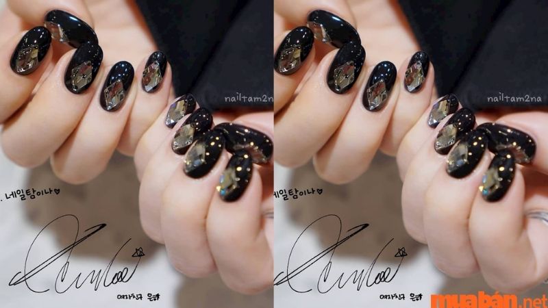 Mẫu nail đen đính đá cá tính 