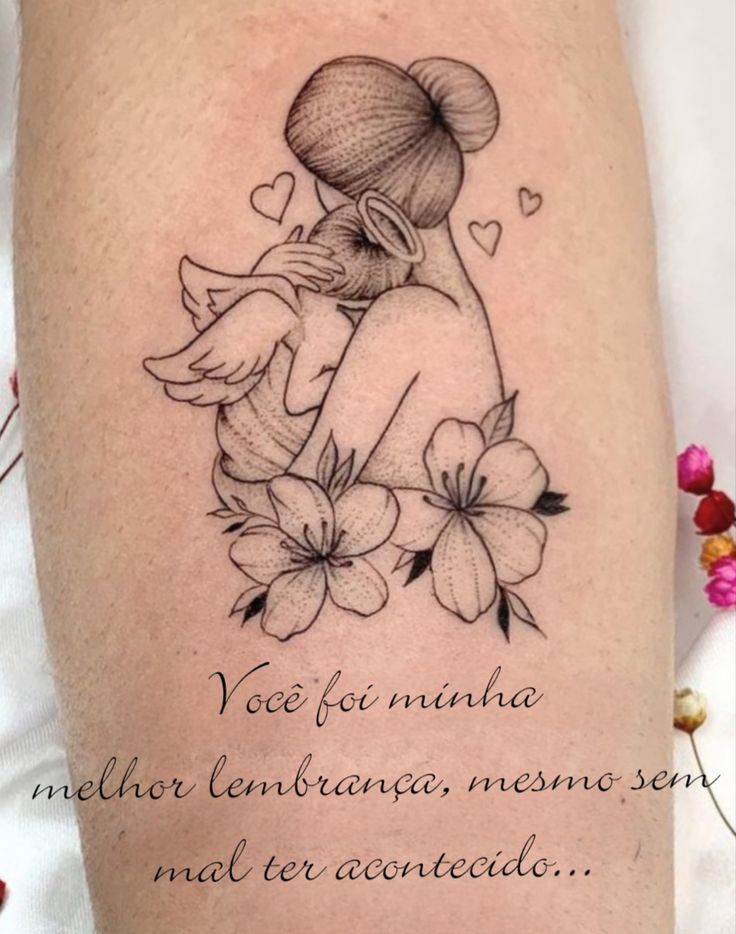 mẫu tattoo mẹ ôm ấp thiên thần nhỏ trên tay